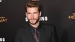 Liam Hemsworth Admits to GQ People Have Already Figured out His Relationship Status