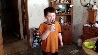 my son pretending to be on american idol