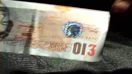 The Queens Bum on a £10 Note.