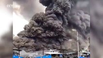 Heavy plumes of smoke billowing from the chemical plant on fire in Yichang City