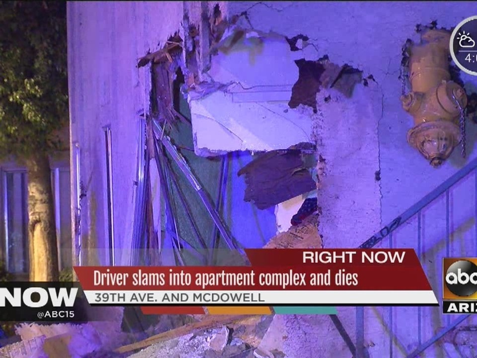 Driver slams into apartment complex