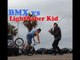 Epic Star Wars Themed Battle Between BMX Rider and Lightsaber Kid