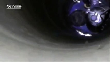 Firefighter hangs upside down to save kid trapped in well