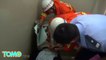 Chinese man gets head stuck in washing machine trying to fix it
