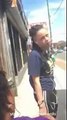 Chicago Gang member catches female opp on street - has a few Words & Spits on her