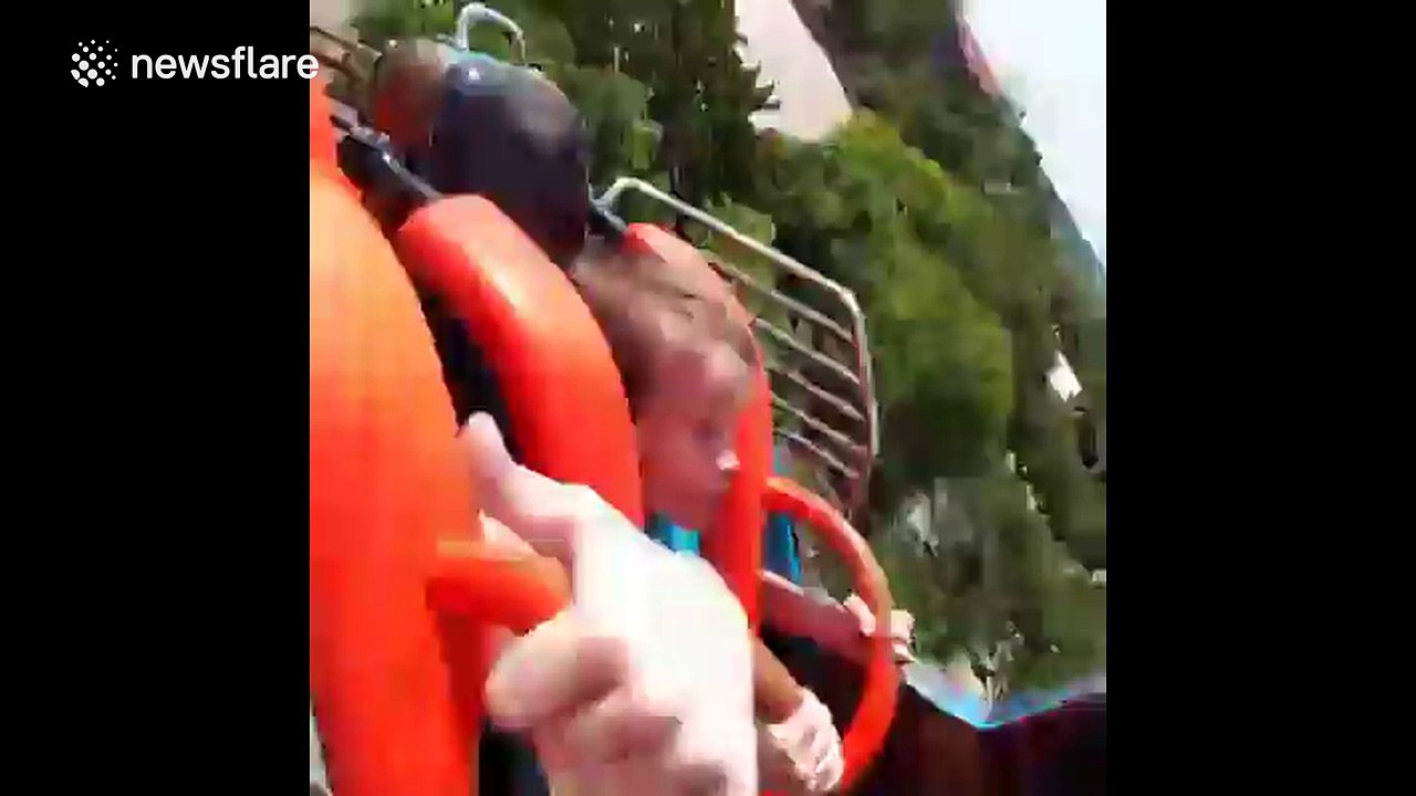 Father takes son on his first ever roller coaster ride