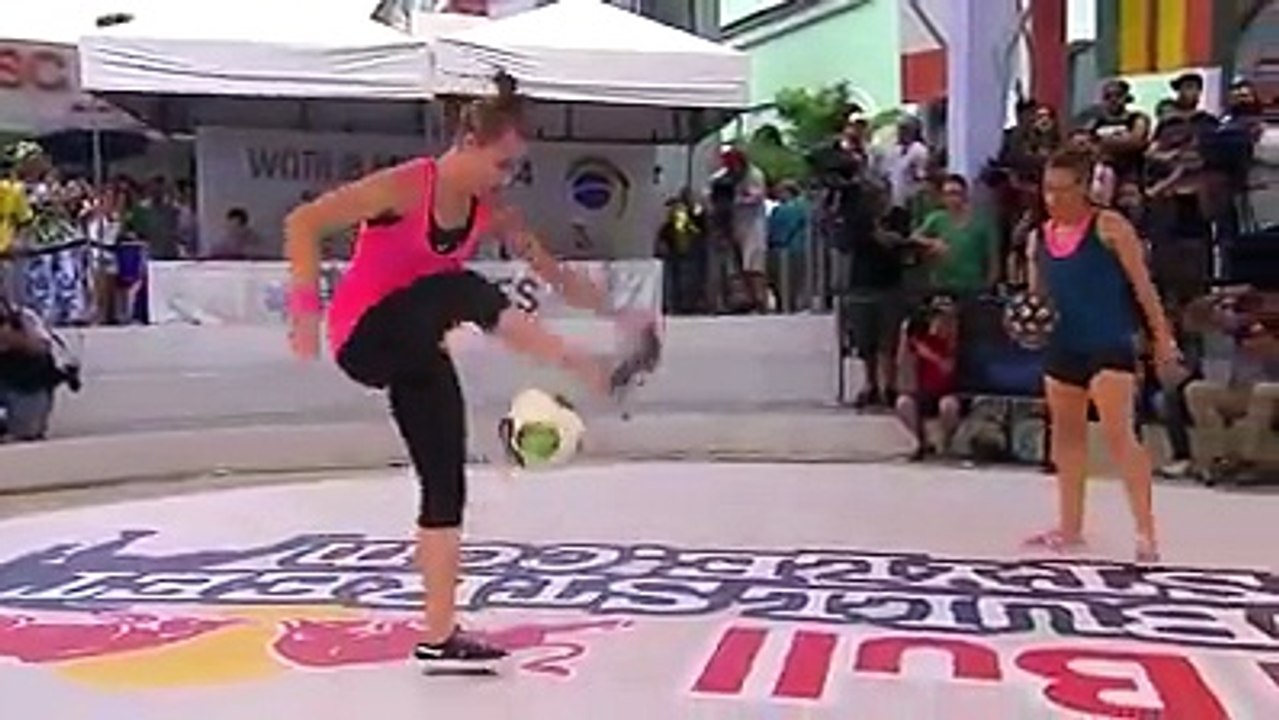 Girl playing stunt with football in live show