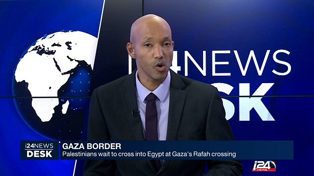 Palestinians wait to cross into Egypt at Gaza's Rafah crossing