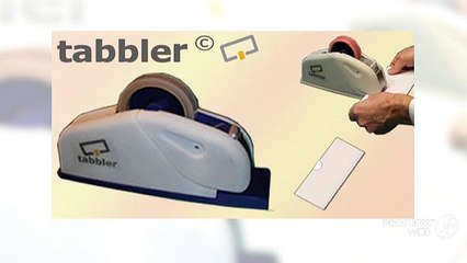 Mail tabbing machines