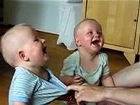 laughing twins - twin babies laugh at their father