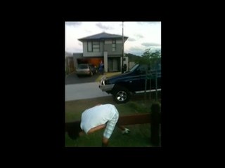 Guy Stands on Fence, Falls and Hits His Nuts