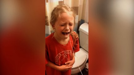 Little Girl Freaks Out Over Pulling Her Loose Tooth