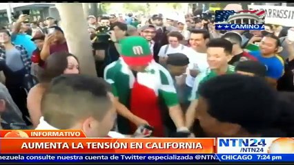 Simpatizantes y opositores al precandidato republicano Donald Trump se enfrentan en la localidad de San José