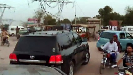 Imran Khan travelling without any Protocol , stuck in Traffic Jam :)