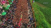 World's longest wooden dragon boat carried into water in Guizhou