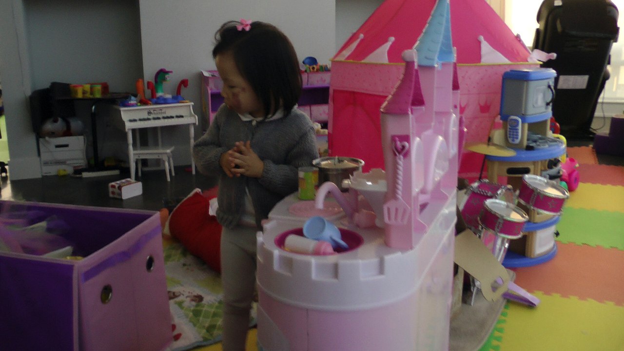 Girl At Her Kitchen