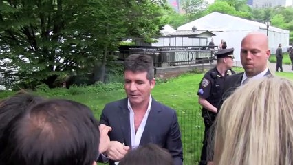 Simon Cowell's son is his "right-hand man".