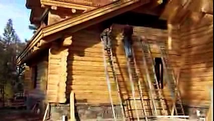 Siding on log house