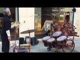 Street performer's amazing drumstick feat