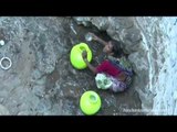 Women climb down 50 feet to fetch water in drought-hit Belgaum