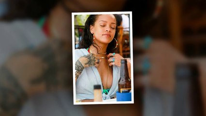 Rihanna Shows Off Cl**vage and B**ty in Sexy Beach Photo Shoot