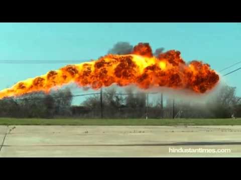 Spectaculat slow-mo shows flamethrower shooting fire 50 feet into the air