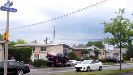 Driver lands on top of two cars after crash