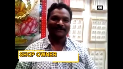 Monkey steals money from the jewellery shop