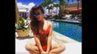 Lea Michele sizzles in black studded swimsuit as she goes for a swim
