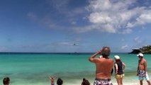 Small Aircraft Land Beside Maho Beach in St Maarten