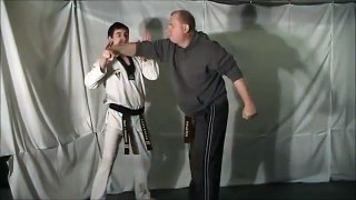 Self Defense Technique Tuesday #170 Defense Against a Punch Wrist Lock