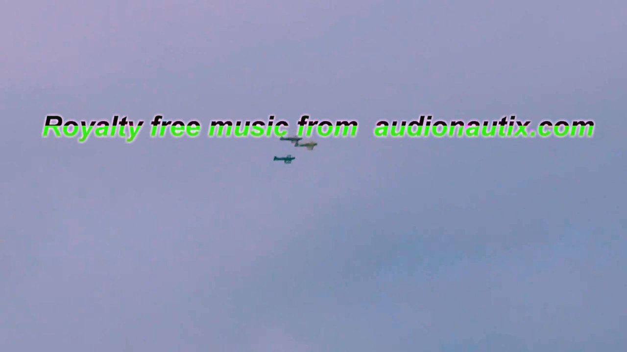 Full Scale Formation Aerobatics Cap, Extra 300S and MSX-RH looping threw the clouds