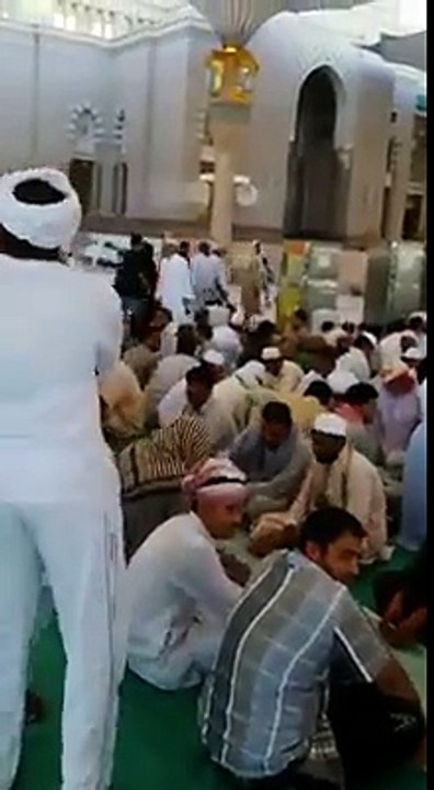 Madinah Al Munawarrah Volunteers welcoming the people outside Masjid e Nabwi for Iftar.
