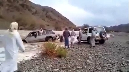 A brave rescue act as water gushes down wadi river in Oman