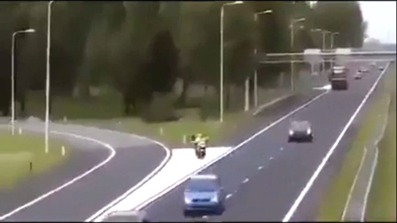 A cop tries to get way for ambulance and what happens to him is shocking