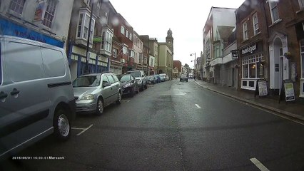 Riderless Motorcycle Continues Down Street After Collision