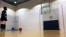 Teenager Shoots Three-Pointer While Doing the Splits
