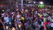 Jamaicans celebrate Usain Bolt's Olympic triple treble