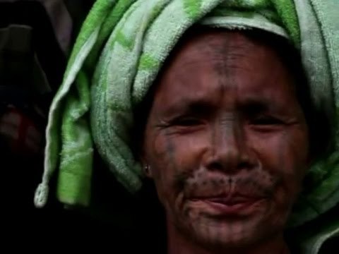 Chin women turn their faces away from painful practice