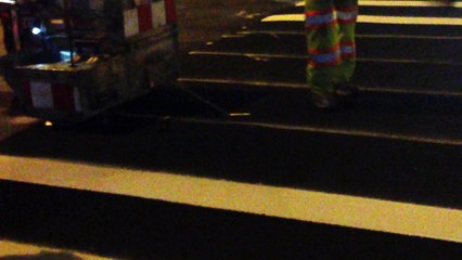 DOT painting crosswalk lines in Cooper's Square, NYC. 08/19/16