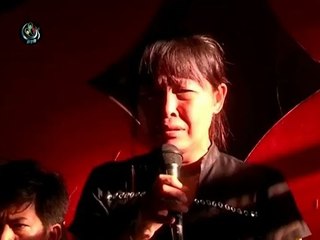 Slain reporter's widow calls for inquiry