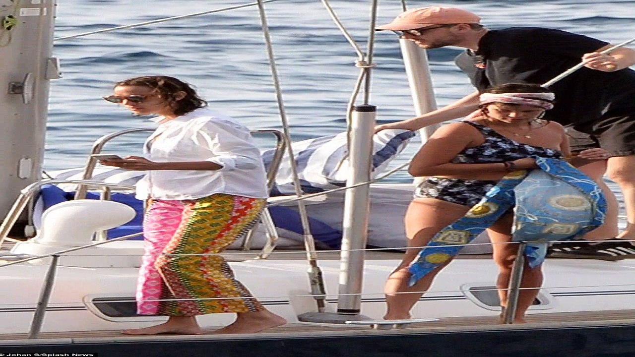 Alexa Chung goes topless as she enjoys a sailing boat trip with bikini clad pal Pixie Geldof in Majo
