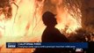 California : firefighters battle raging wildfire growing to more than 14000 acres
