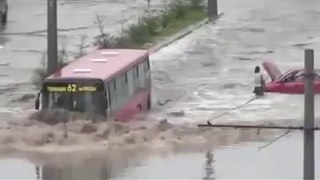 Bus Drives Through Flooded Street - Cool