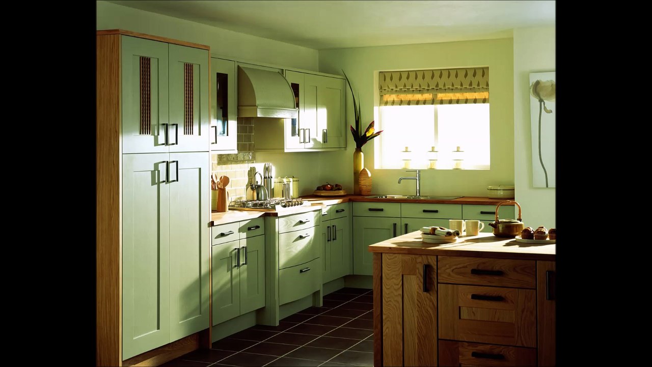 Kitchen With White And Green Furniture