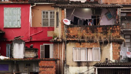 RIO DE JANEIRO, BRAZIL - JUNE 23: Slow-mo of woman doing laundry in a favela Rio de Janeiro, 2013