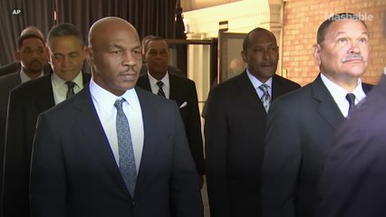 Will Smith and Mike Tyson carry Muhammad Ali's coffin