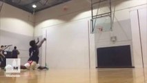 Talented teenager makes a three-pointer while doing a full split