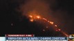 Firefighters battle rapidly changing conditions