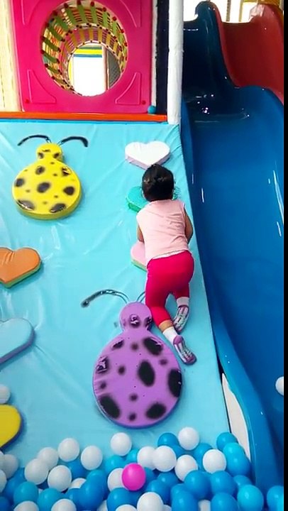 Toddler K wall climbing